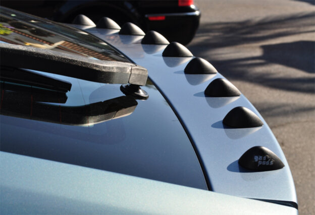 Black AeroHance Pods on the truck of a car